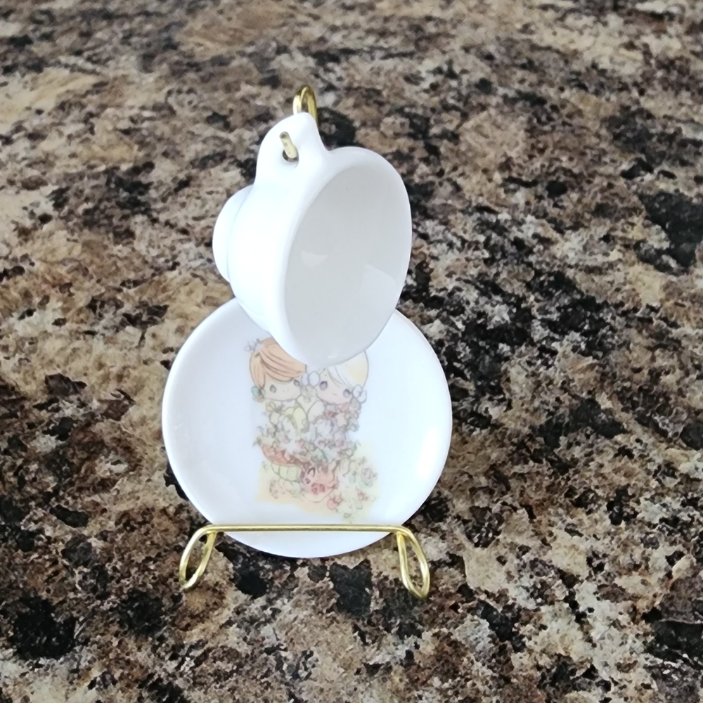 Adorable White Teacup and Saucer Set